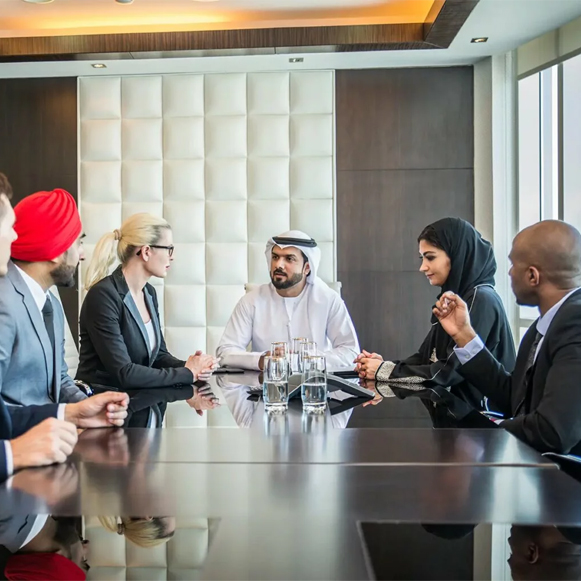 An DUBAIi celebration with multiple men wearing traditional clothes in a celebratory dance